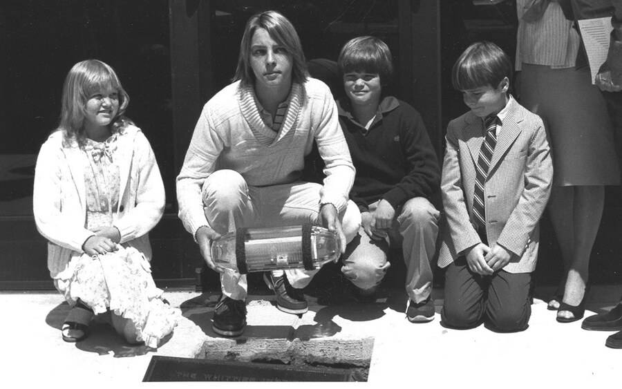 Diabetes patient Zach Leigh, third from left, joined philanthropist N. Paul Whittier, far right, and others during the dedication and opening of the Scripps Whittier Diabetes Institute in 1982.